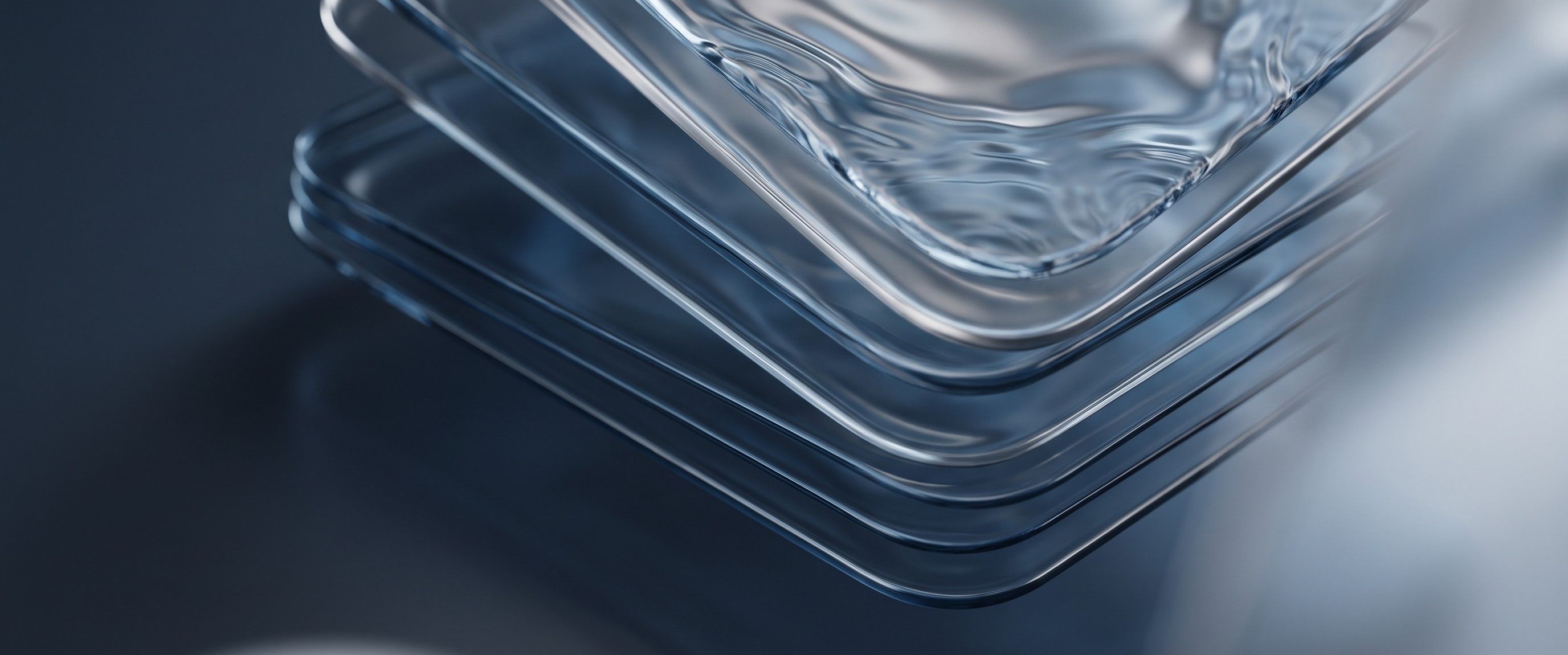 Website erstellen lassen: abstrakte Glasform in Blau und Grau als Sinnbild für Websites